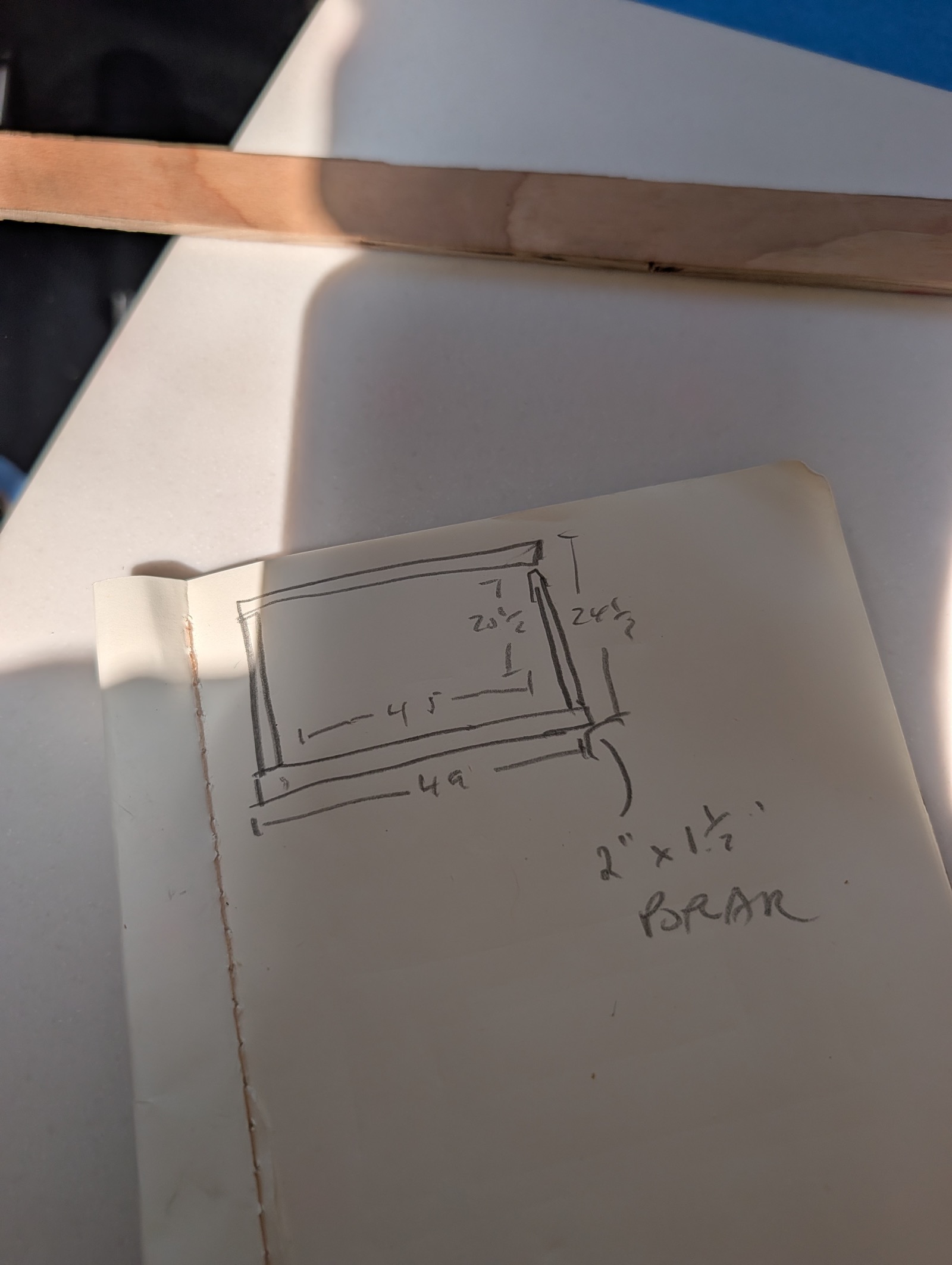Notebook page with the rail frame dimensions