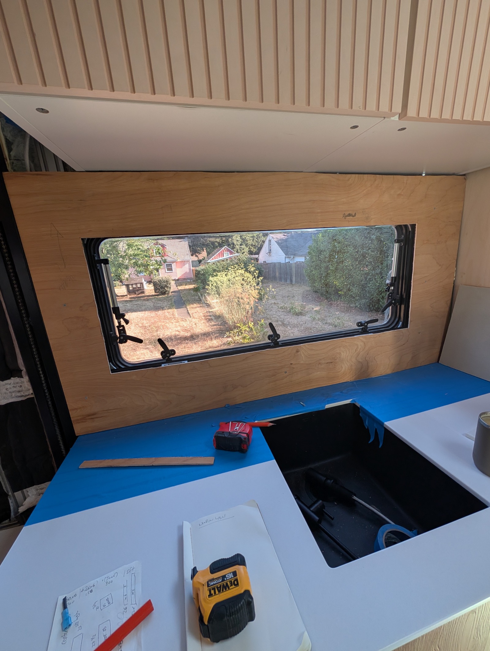 Kitchen window panel dry-fit over the sink