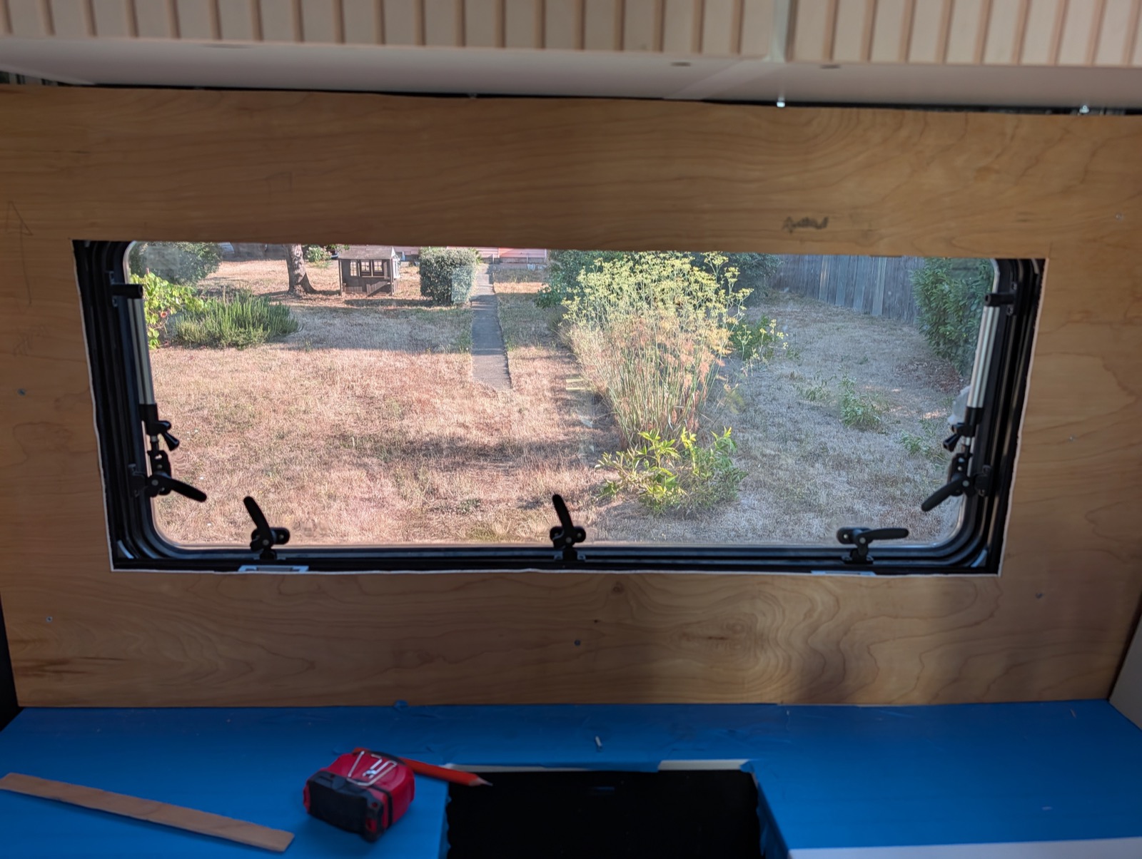 Window through the panel cutout, straight on
